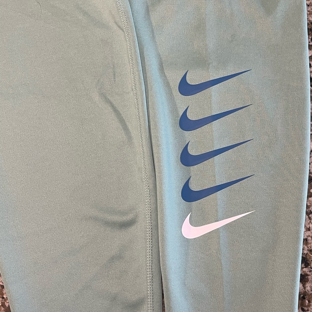 Two pairs of Nike workout pants!